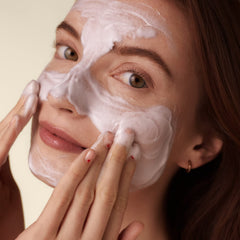 Shiseido Deep Cleansing Foam being rinsed with water for a clean finish