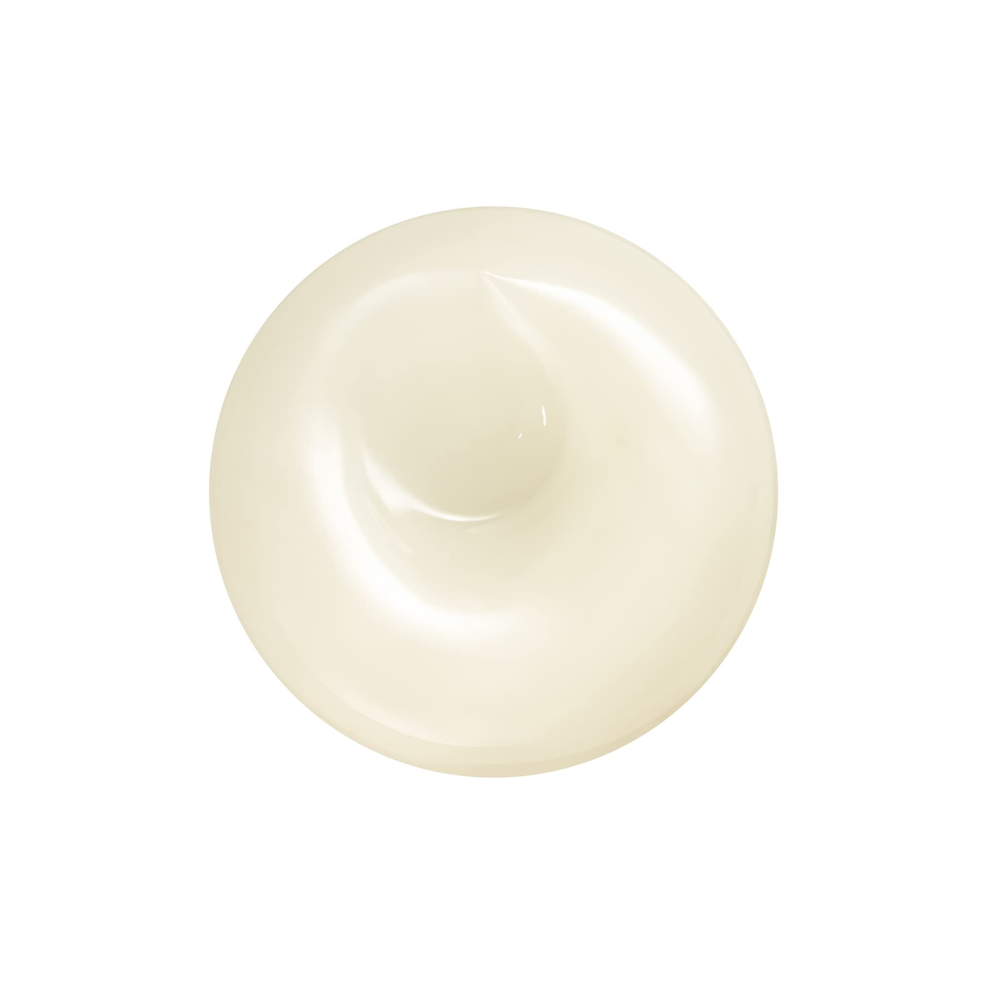 Hand applying Shiseido Men Total Revitalizer Cream in morning routine.