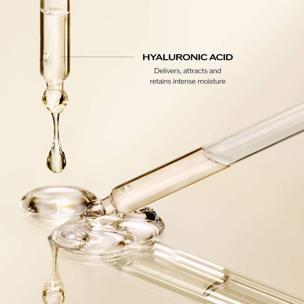 Applying Shiseido Urban Environment sunscreen for primer-like base on the face.