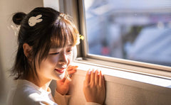 SHOBIDO Miffy die cut bangs clip worn on hair demonstrates quick bangs retention.