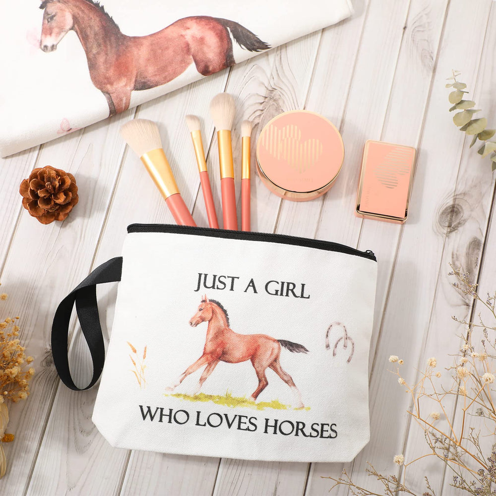 Sieral makeup bag featuring the 'just a girl who loves horses' print.