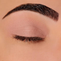 Sigma Beauty Eyeshadow Primer Base swatch on arm showing true shade.