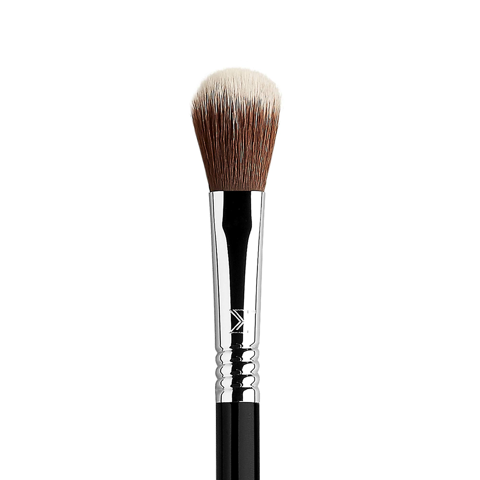 Sigma Beauty F03 highlighter brush fluffy yet firm head in action.