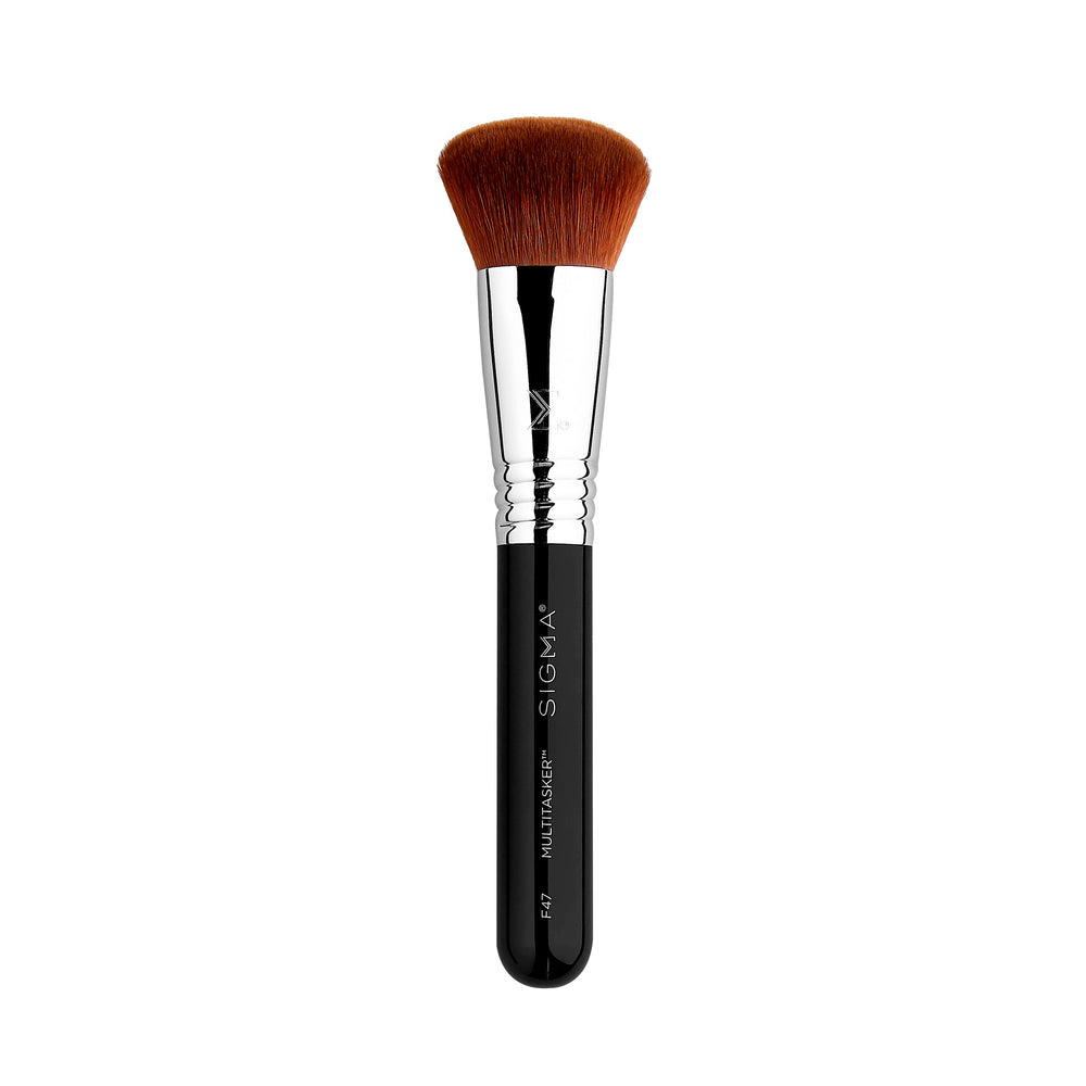 Sigma Beauty F47 Multitasker brush ready for foundation application with a smooth, even base.