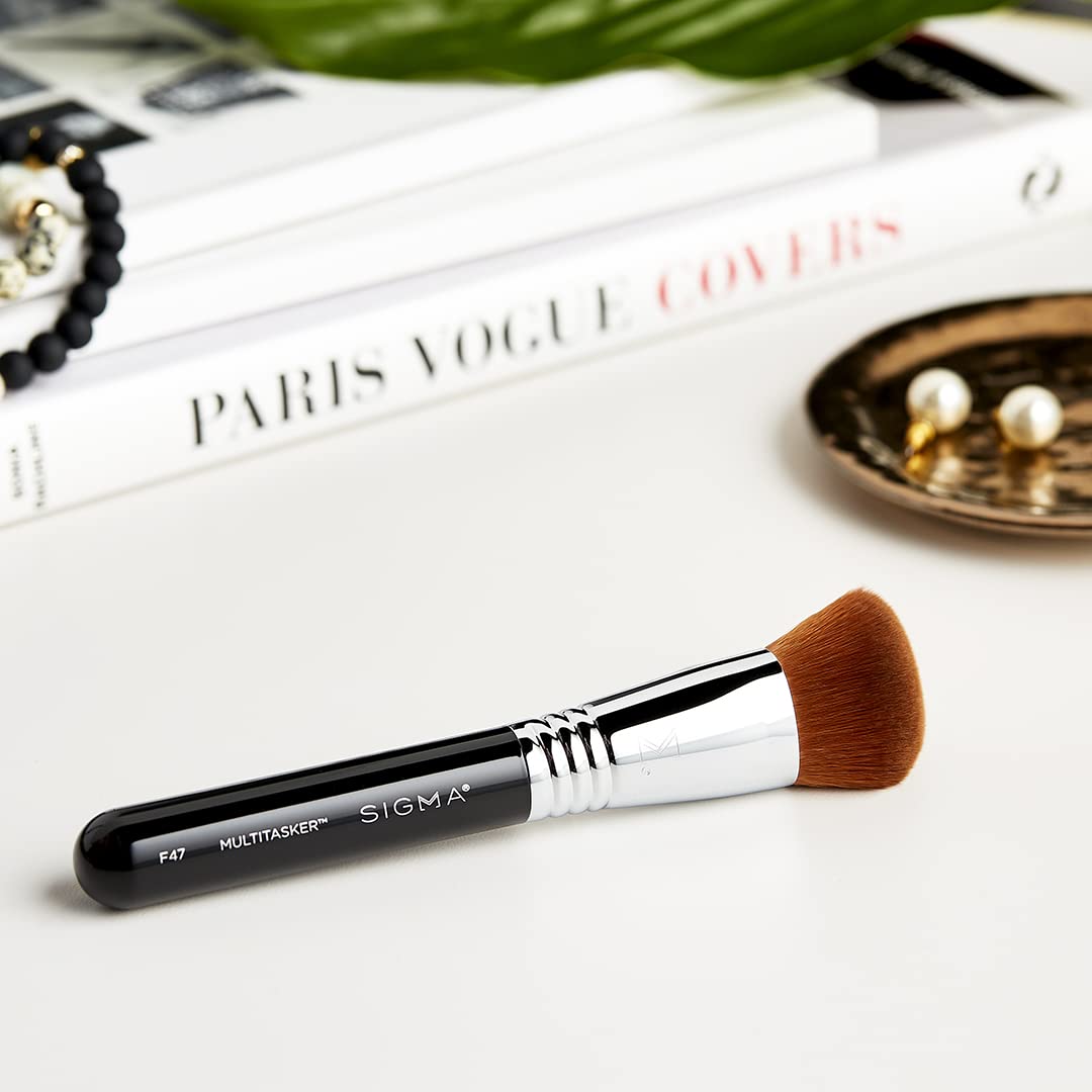 Sigma Beauty F47 Multitasker being cleaned with brush shampoo.