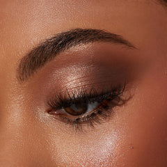 Sigma Beauty quad applies with brush for buttery-soft textures and seamless blending.