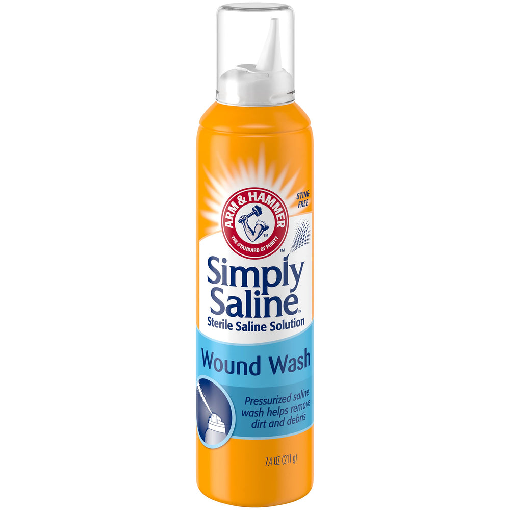 Simply Saline wound wash close-up removing dirt and debris from a minor cut