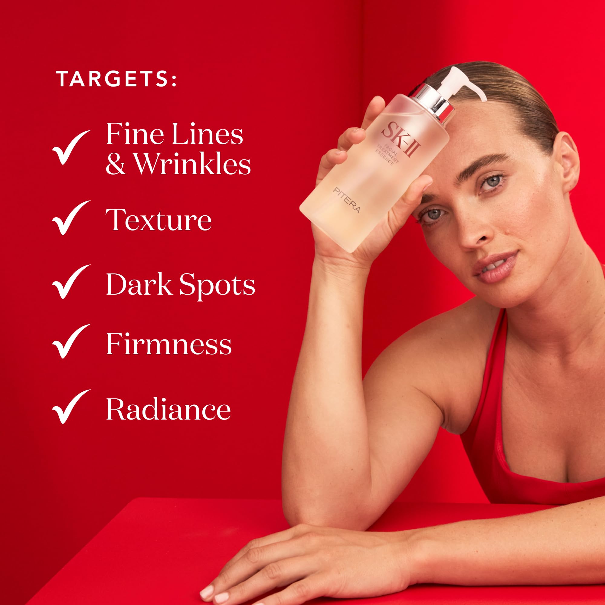 SK-II essence pressed onto face and neck to boost hydration.