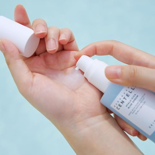 SKIN1004 Hyalu-Cica Blue Serum texture drop suggests lightweight, non-greasy layering.