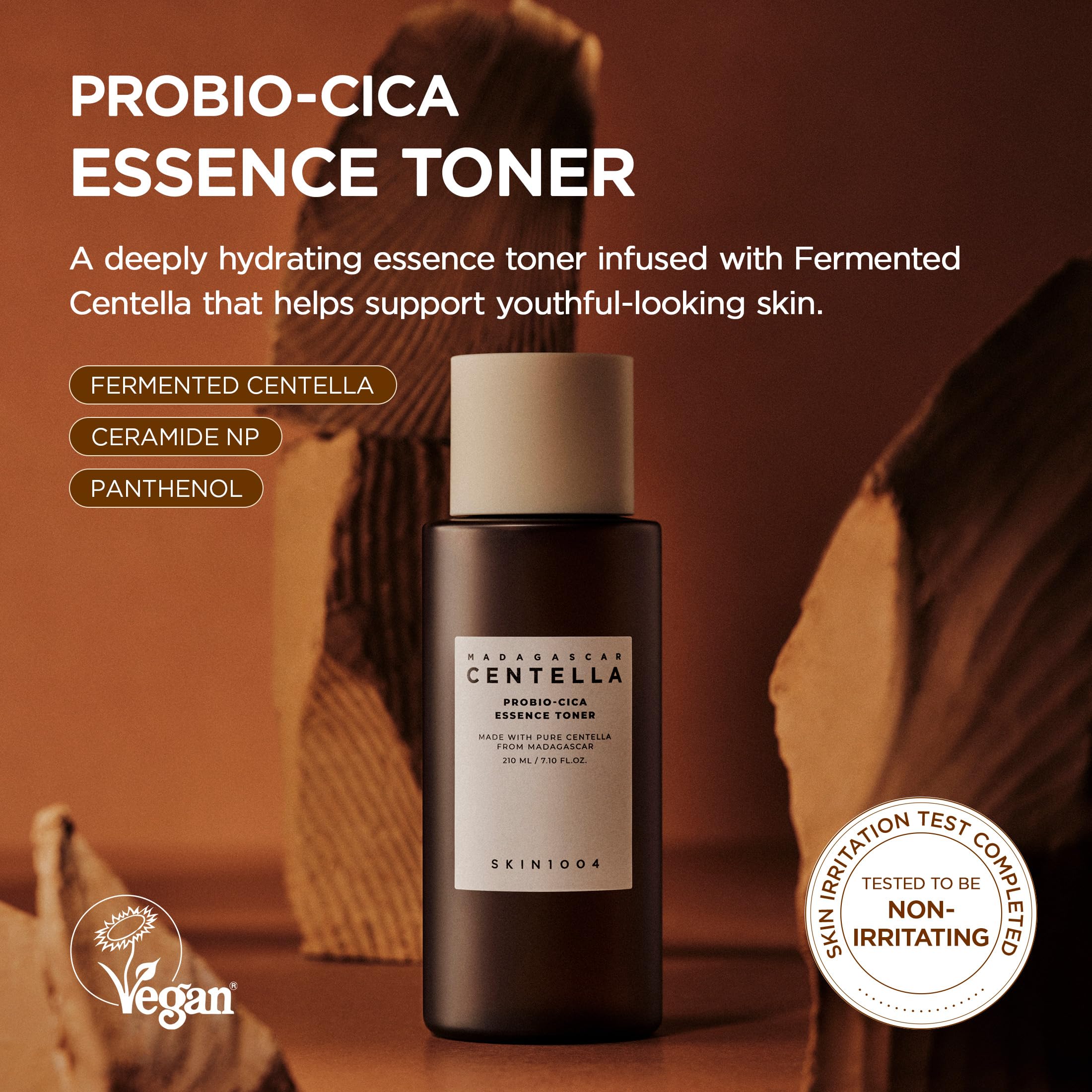 SKIN1004 Probio-CICA Essence Toner with watery-essence texture for quick absorption.