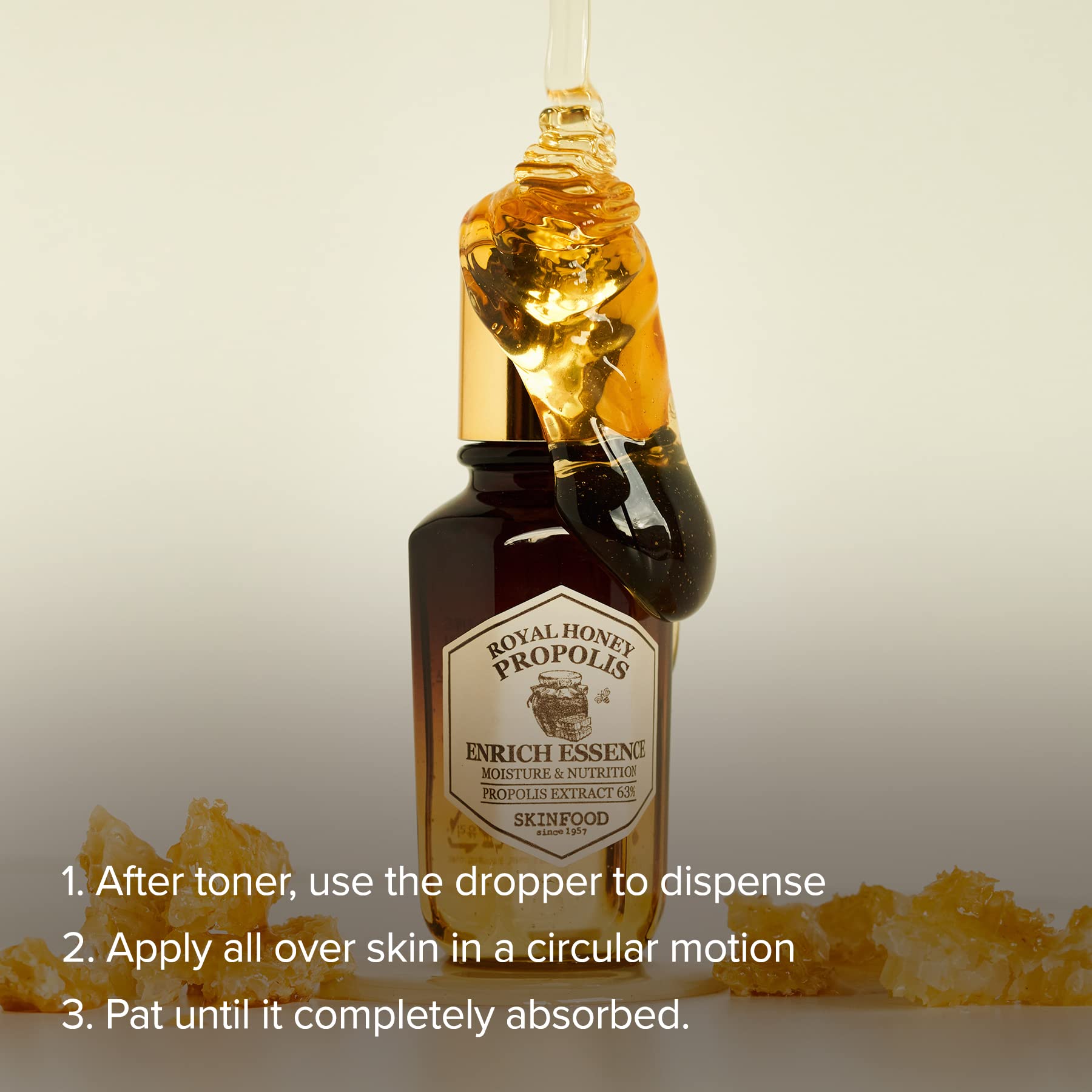 SKINFOOD 1957 Royal Honey Propolis Enrich Essence hero bottle on white