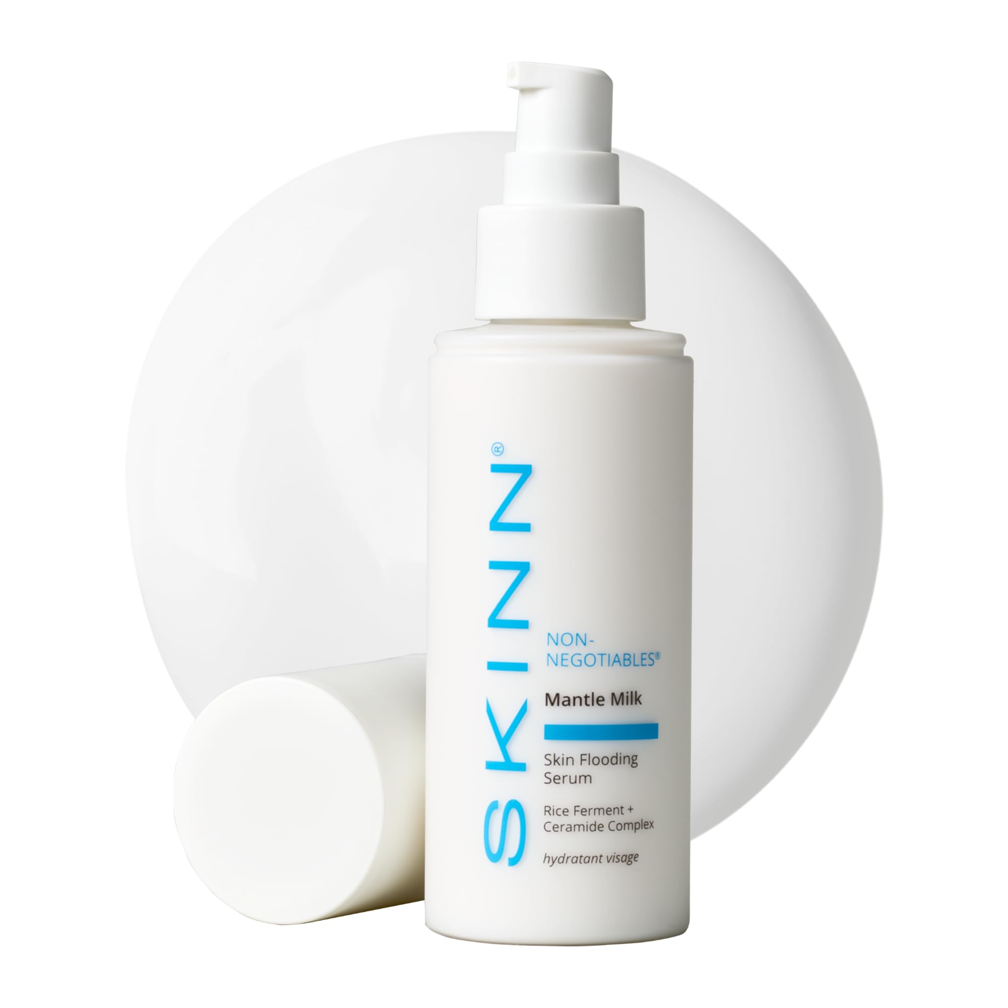SKINN Mantle Milk Serum bottle on vanity highlighting hydration benefits