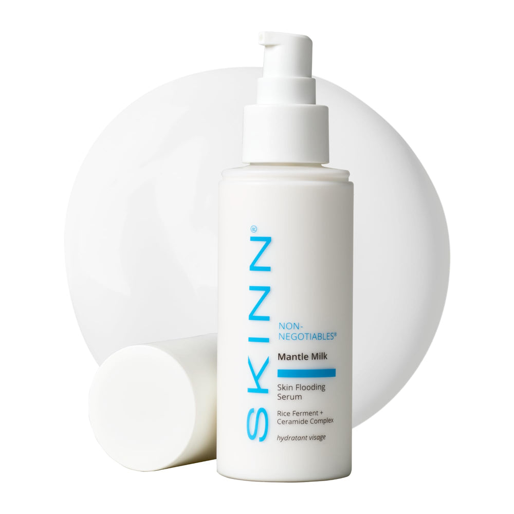 SKINN Mantle Milk Serum bottle on vanity highlighting hydration benefits