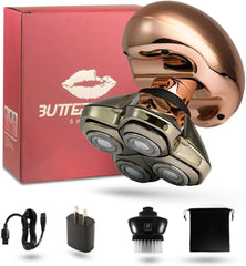 Skull Shaver Butterfly Kiss Pro close-up in rose gold highlighting ergonomic grip for gentle shaving