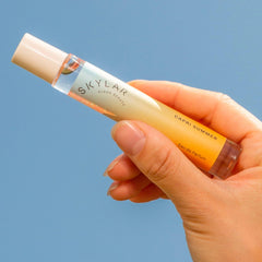 Skylar Capri Summer top-notes image shows grapefruit, blood orange, bergamot for a bright mood.