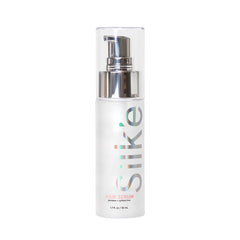 Sleek'e Silk'e Hair Serum bottle closeup for frizz control and silky shine.