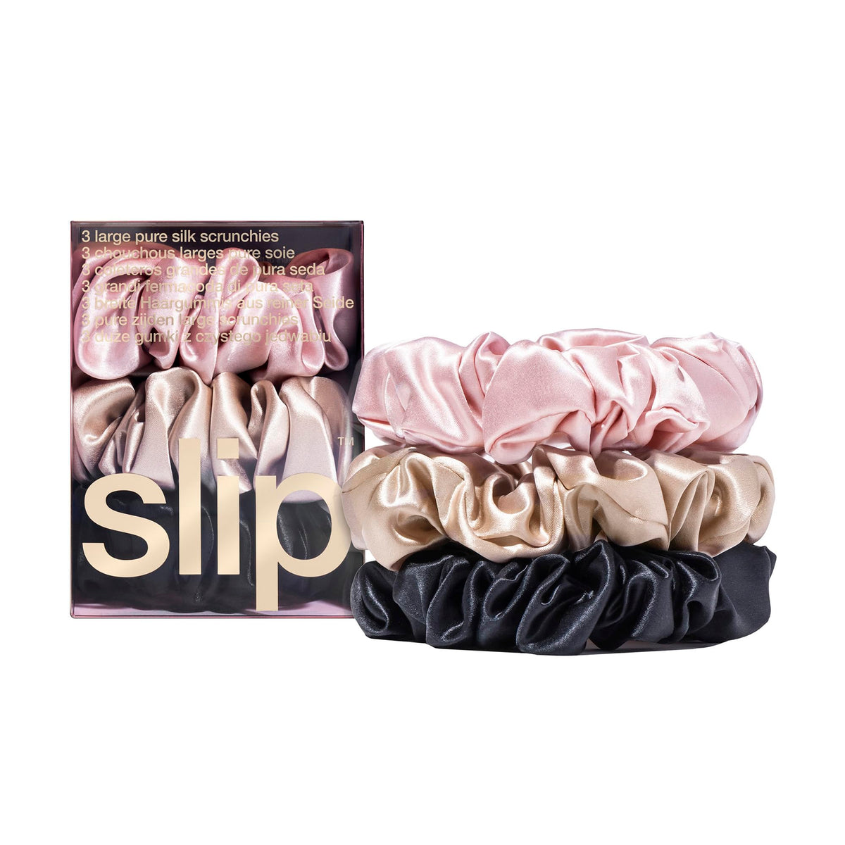SLIP large scrunchie multi pink closeup: smooth silk reduces friction for gentler hair wear.