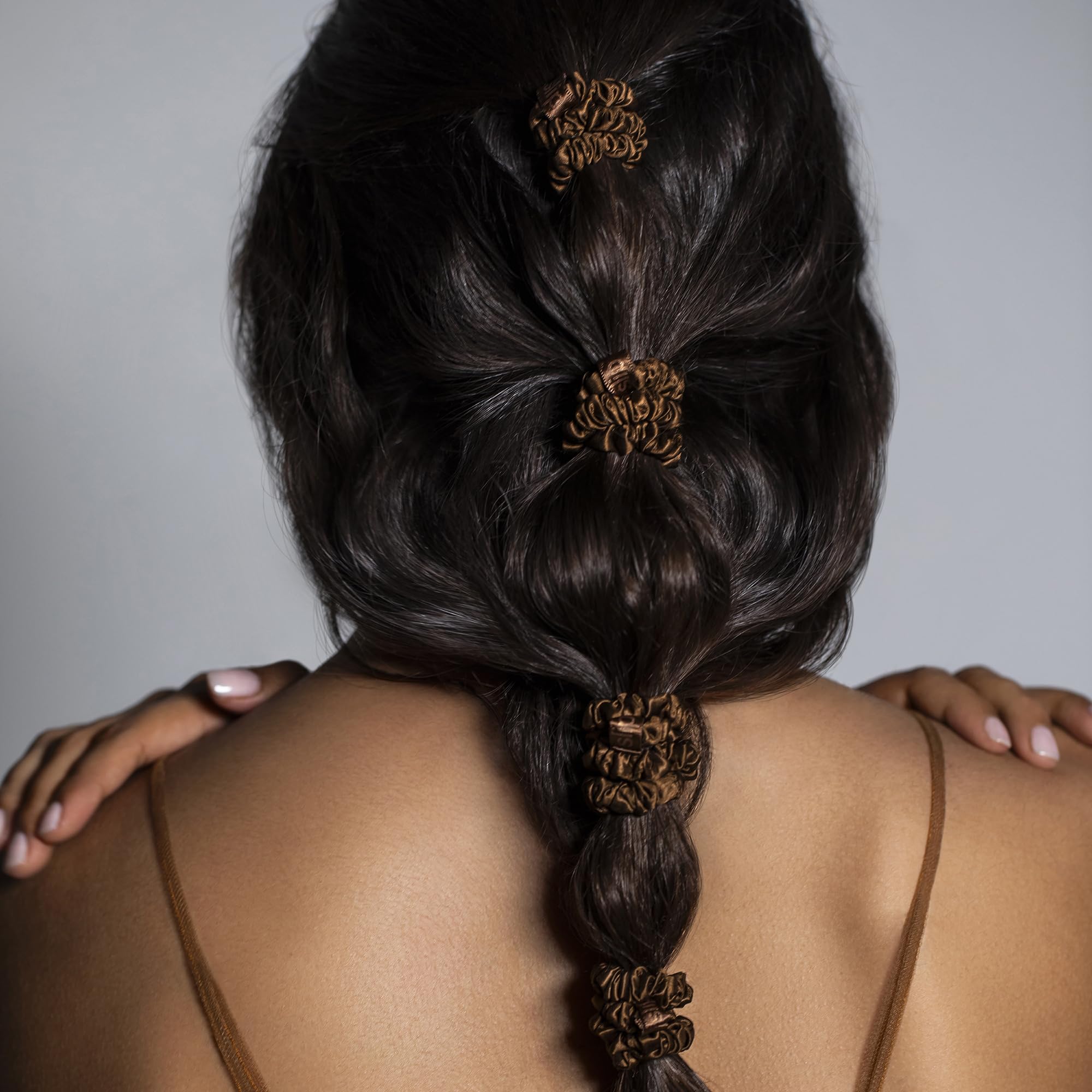 SLIP skinny scrunchies three-colors on hands illustrate style options