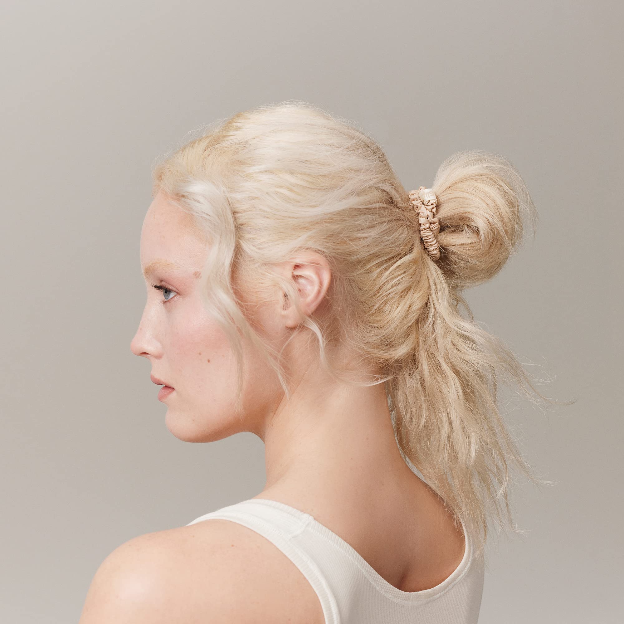 SLIP Skinny Scrunchies compact travel case shows portability and silk care on the go.