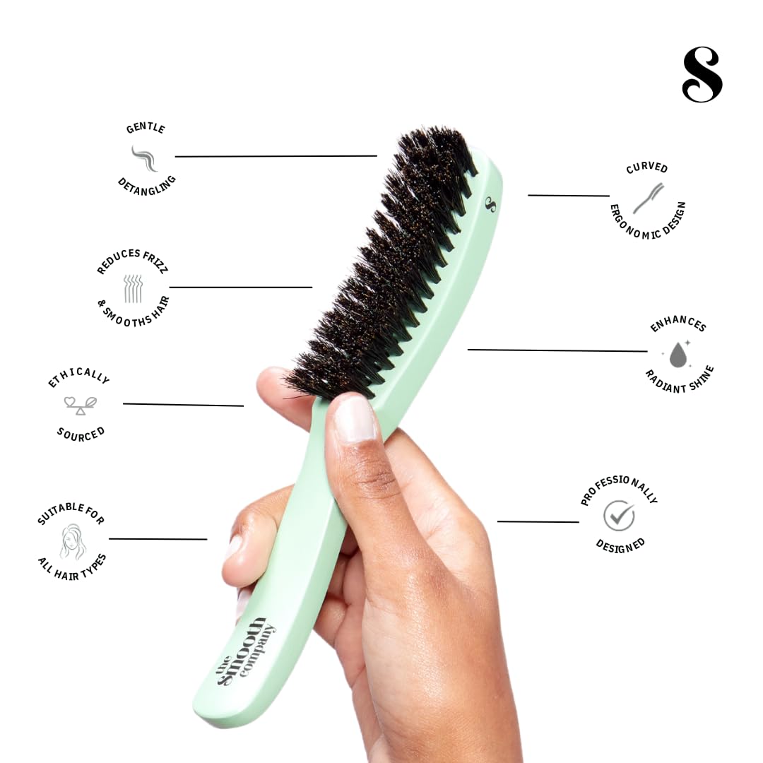 Smooth Stick Mane Master curved brush on long hair for salon-like shine.