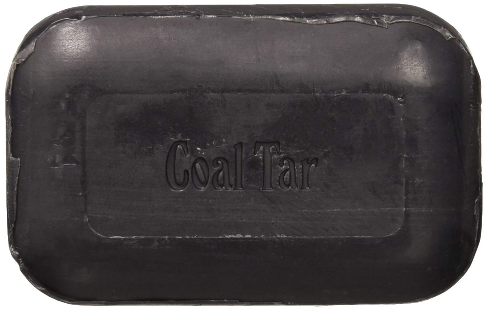 The Soap Works coal tar bar soap lathering into rich foam for gentle cleansing.