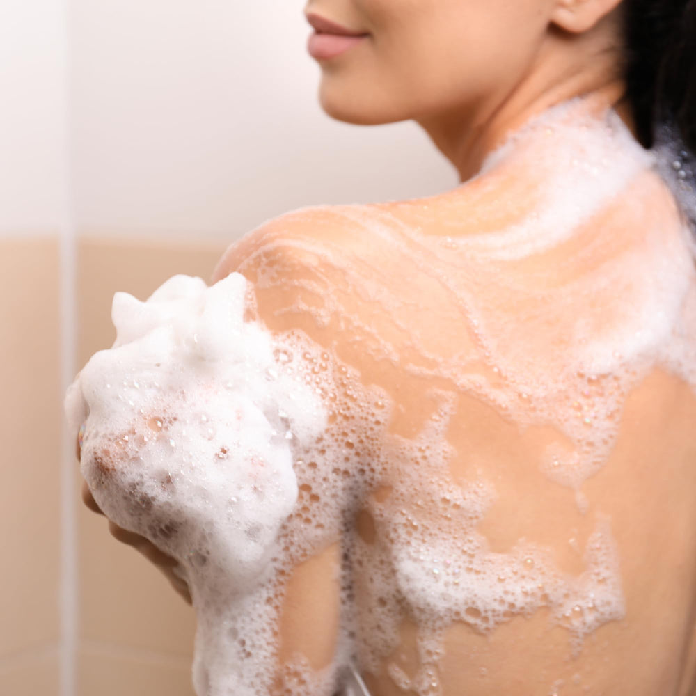 Soapbox Coconut Goji Bodywash label closeup featuring shea butter and hyaluronic acid.