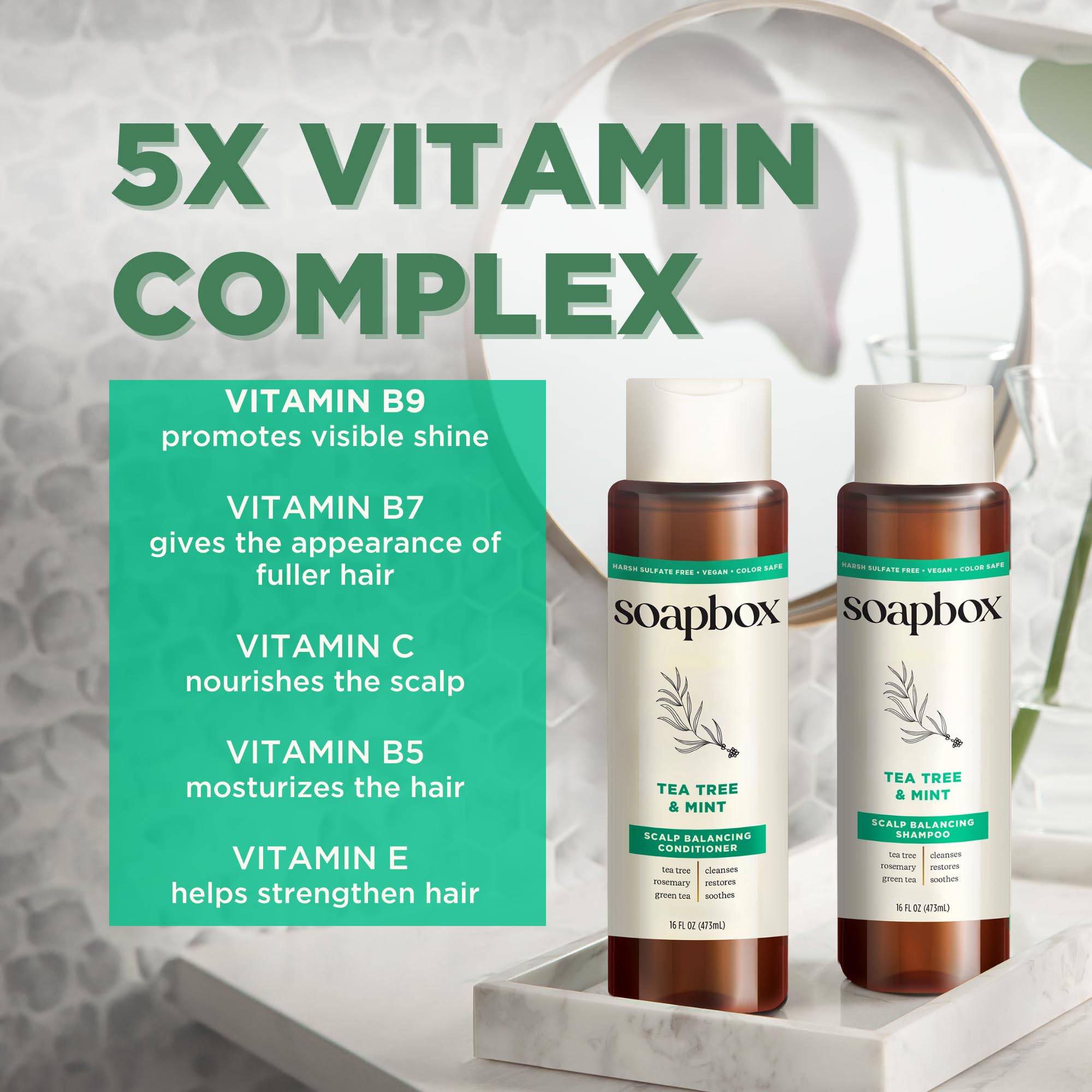 Soapbox Tea Tree Conditioner application closeup shows smooth detangling benefit.