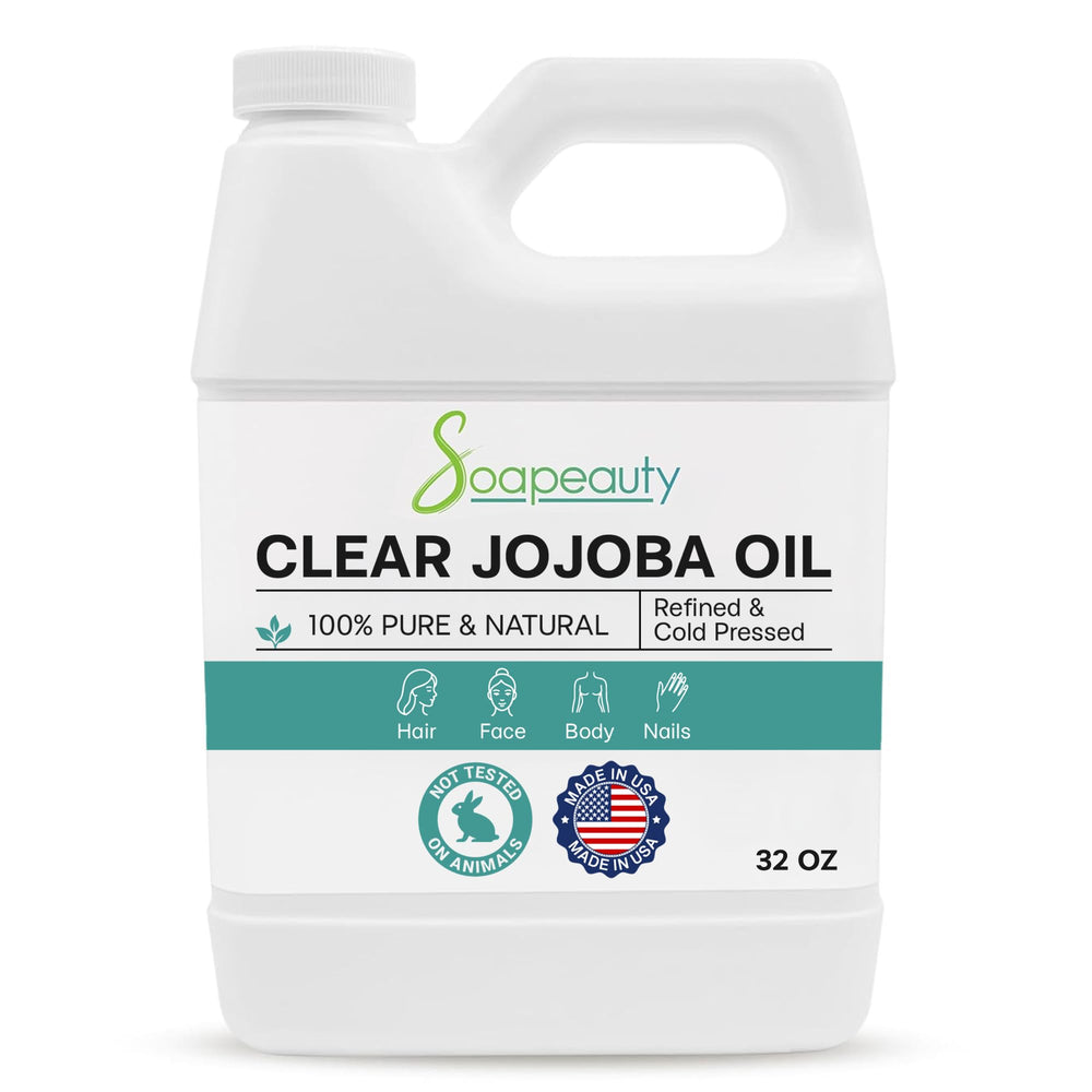 Soapeauty Clear Jojoba Oil bottle with label, 32oz, a versatile skin, hair, and nails hydrator.