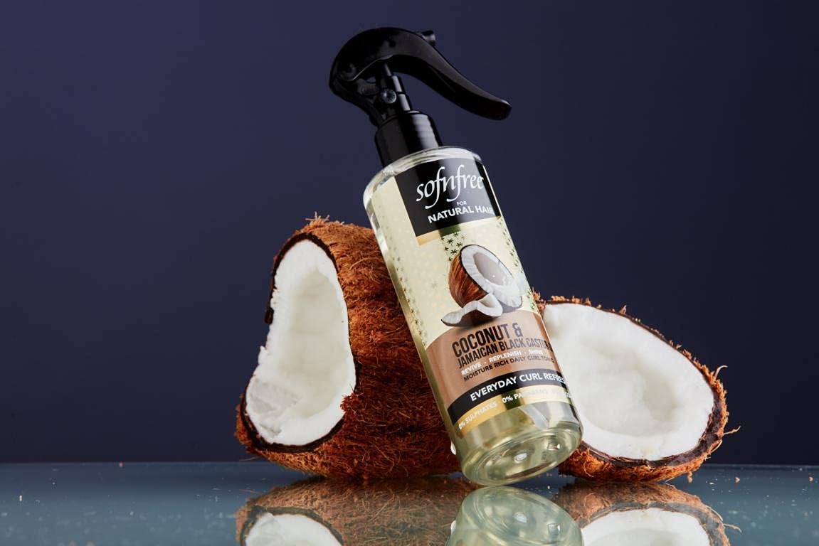 Sofn'free curl refresher spray on hair demonstrates lightweight hydration and shine.