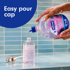 Close-up of Softsoap refill cap highlighting easy-open top for spill-free filling