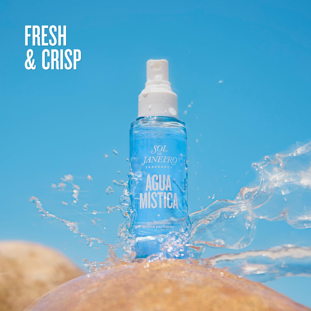 Sol de Janeiro Agua Mistica neroli and tangerine notes close-up, bright fresh-citrus mood.