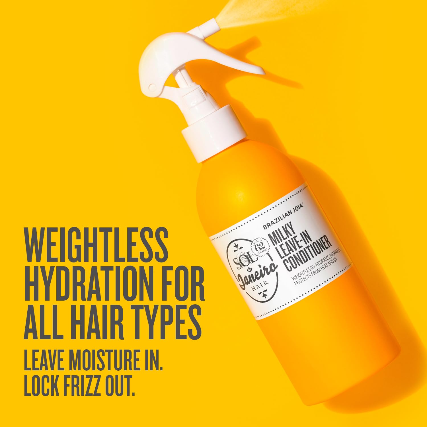 Sol de Janeiro Milky Leave-In conditioner being sprayed onto damp hair for detangling.