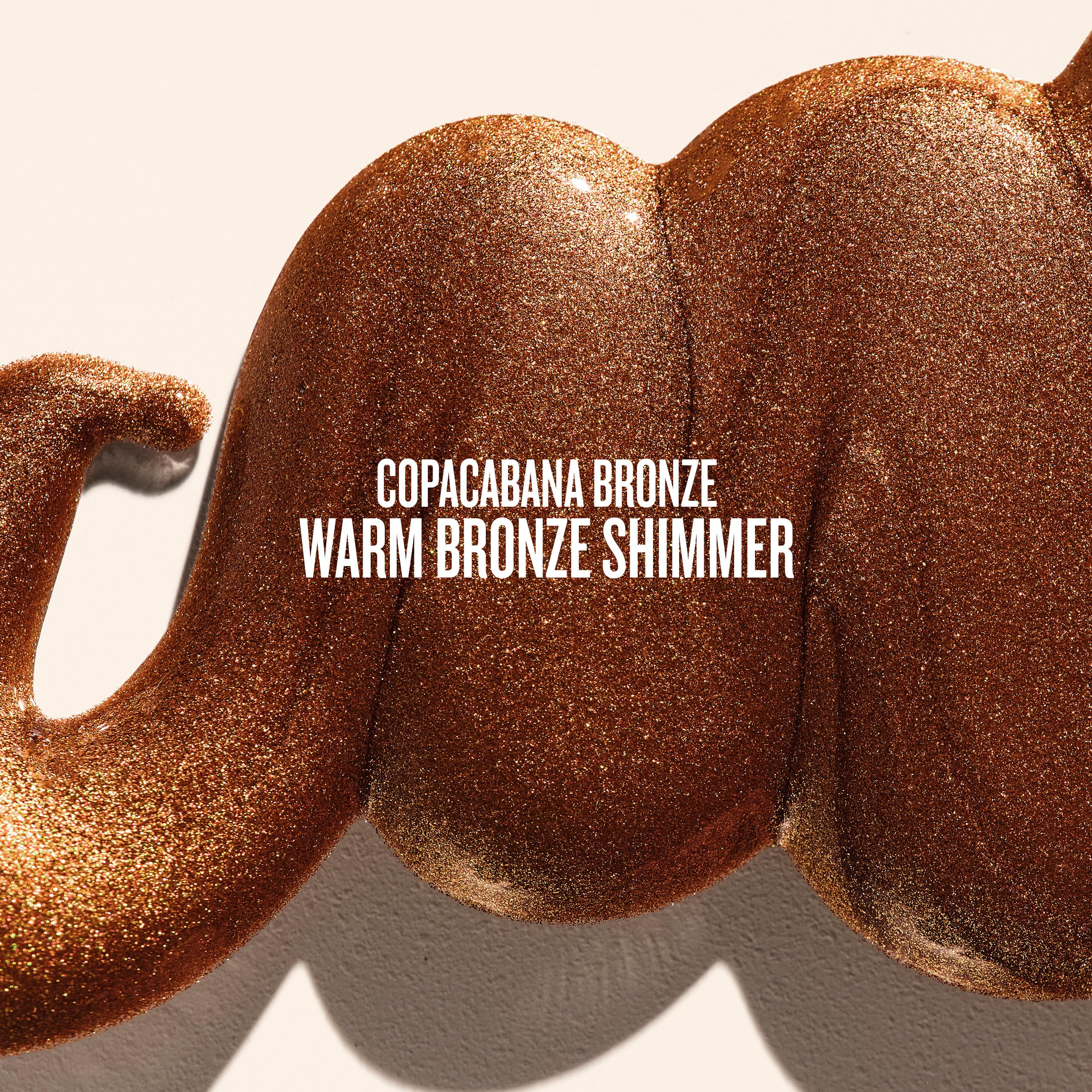 Sol de Janeiro Glowmotions Glow Body Oil application on arm provides dew-like radiance.