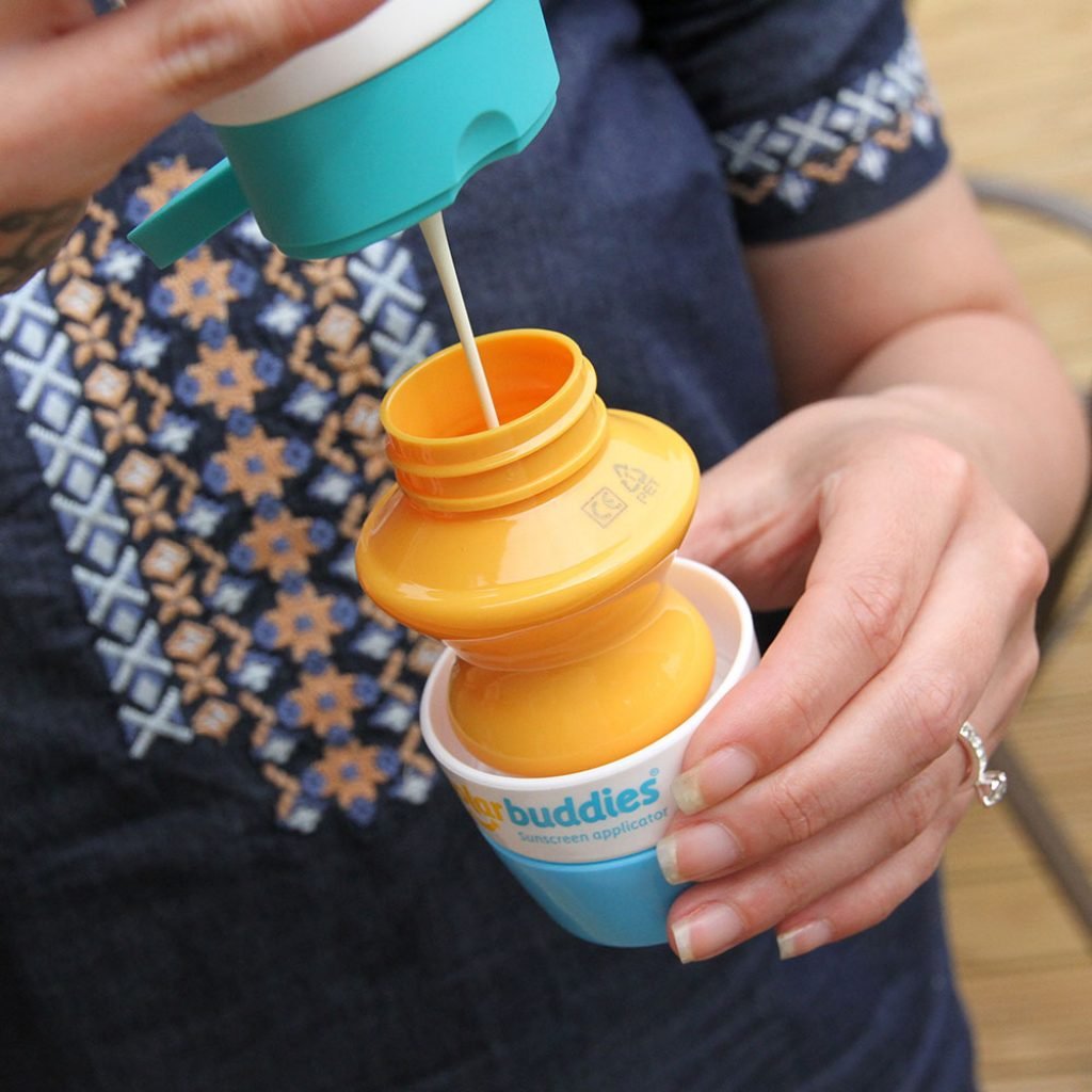 Solar Buddies refillable 3-4oz bottle blue demonstrates travel-friendly sunscreen delivery.