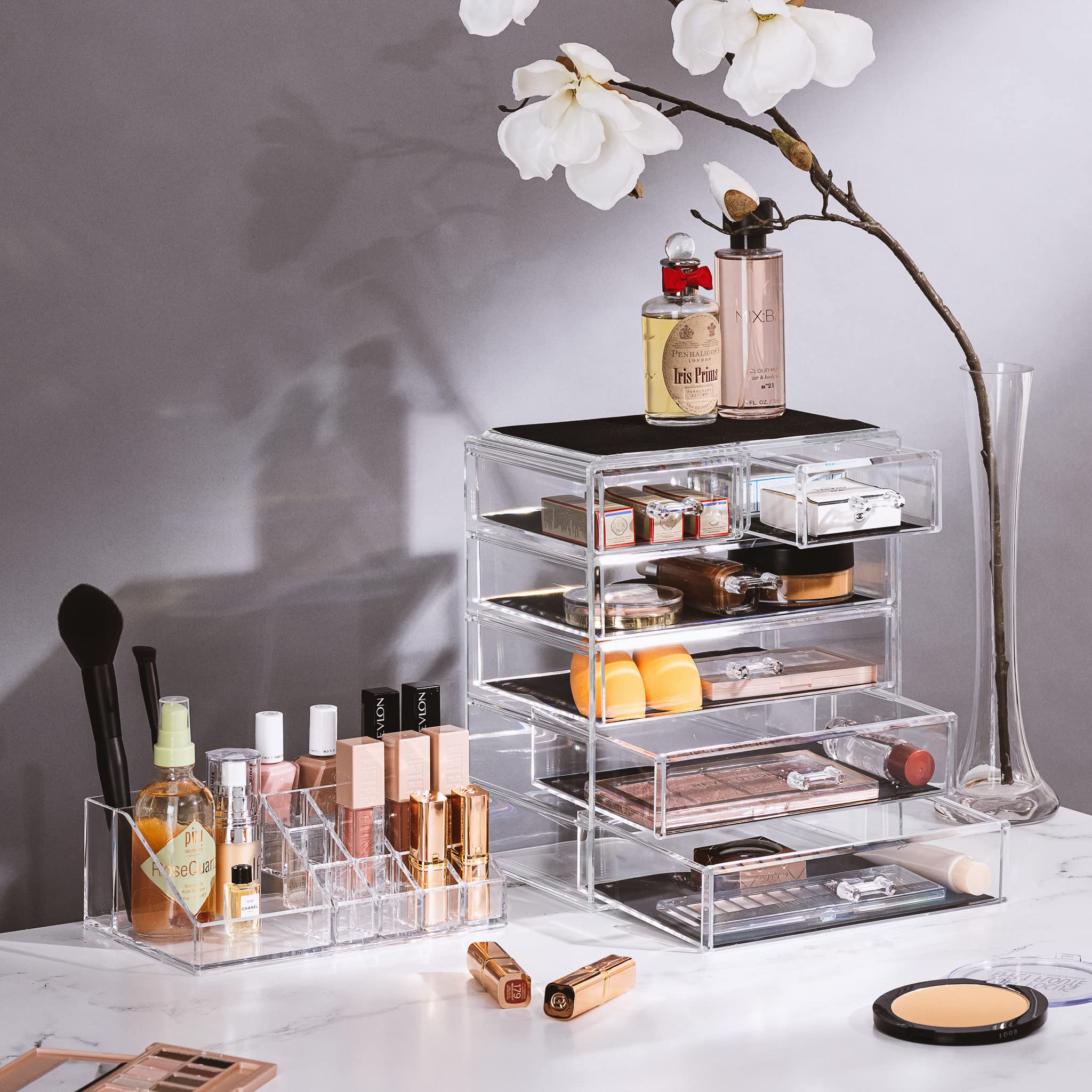 Sorbus acrylic makeup organizer top compartment keeps small items within reach for quick routines.