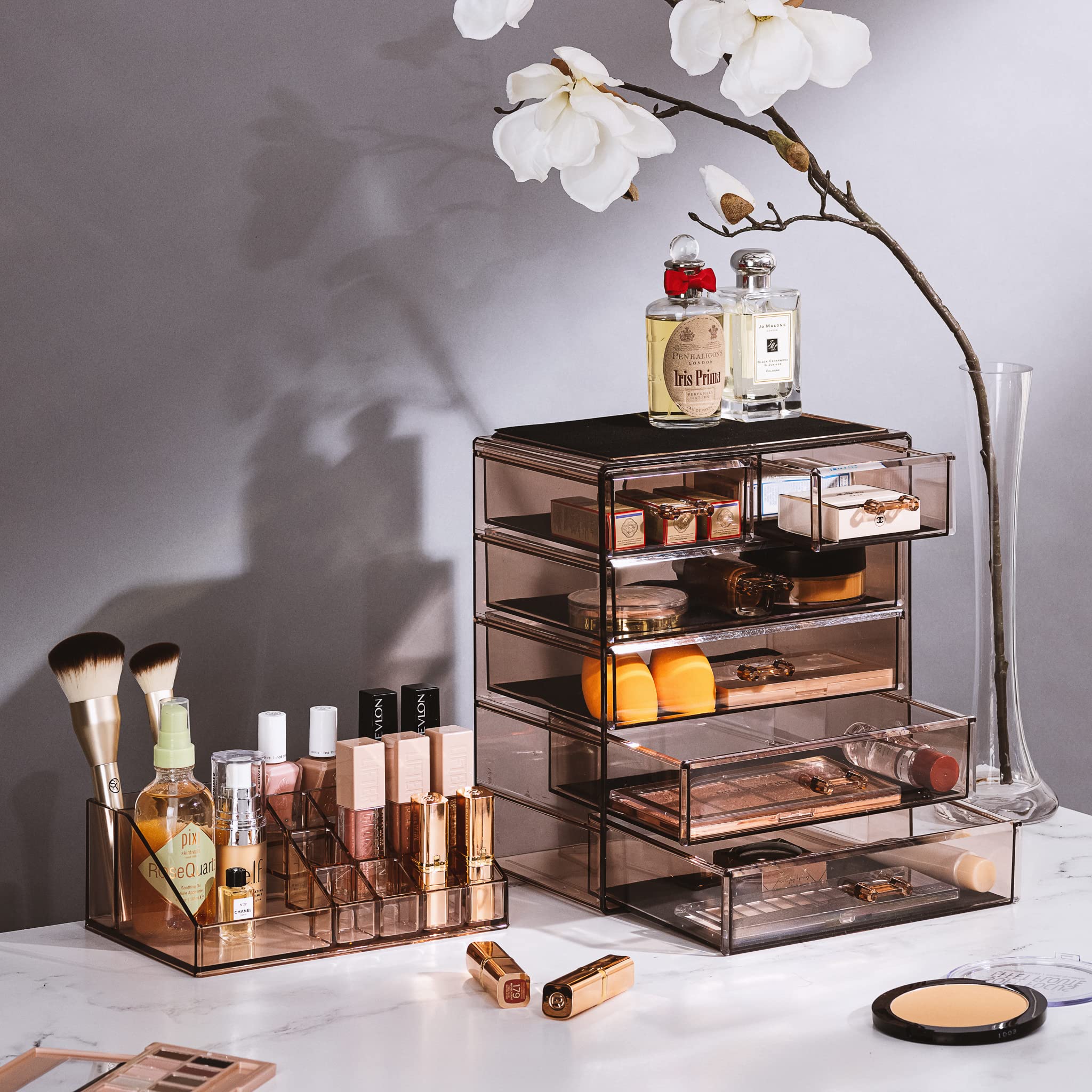 Sorbus bronze glow finish close-up highlights clear acrylic and modern vanity appeal.