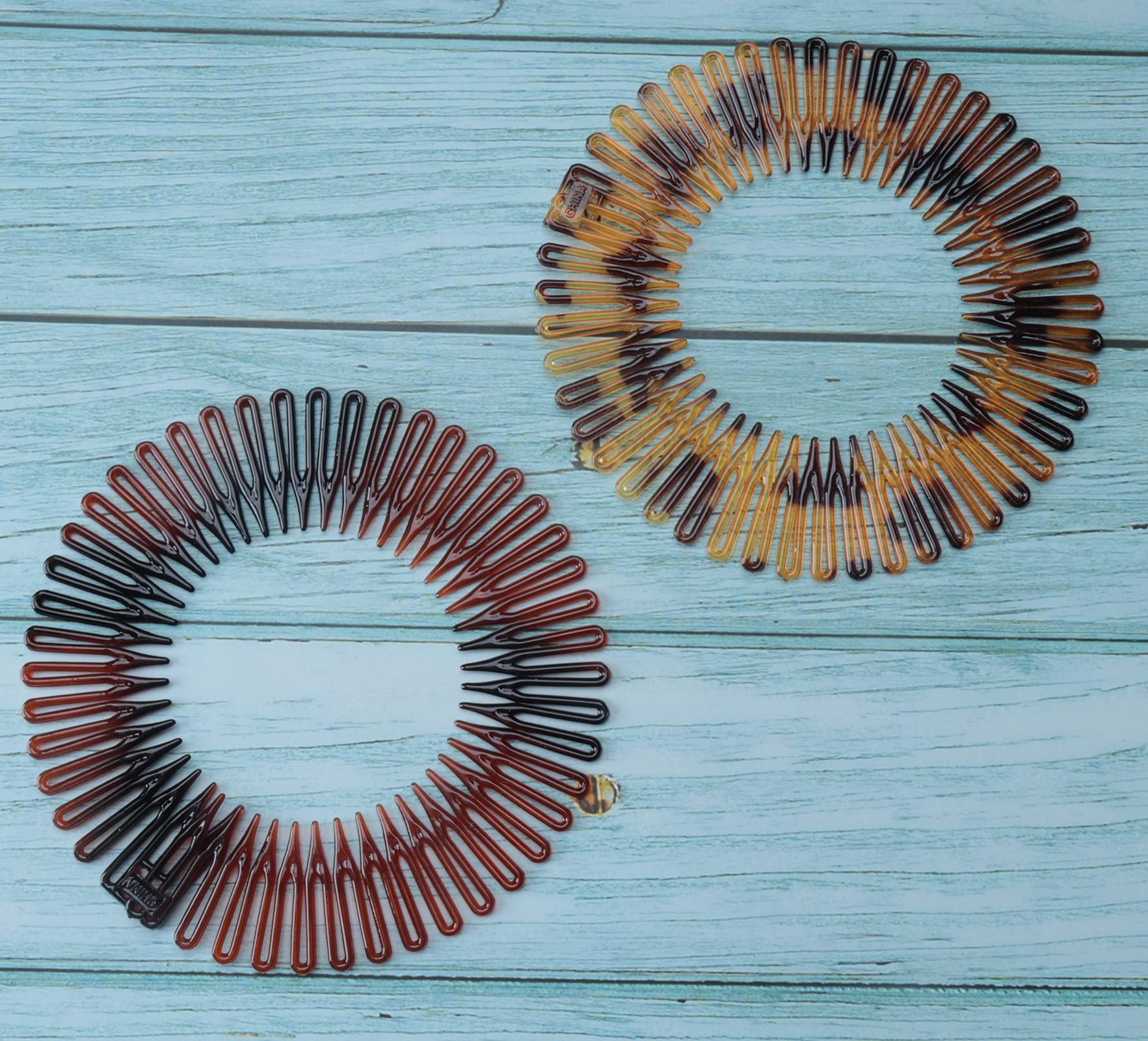 Sowaka compact-travel round comb for on-the-go styling.