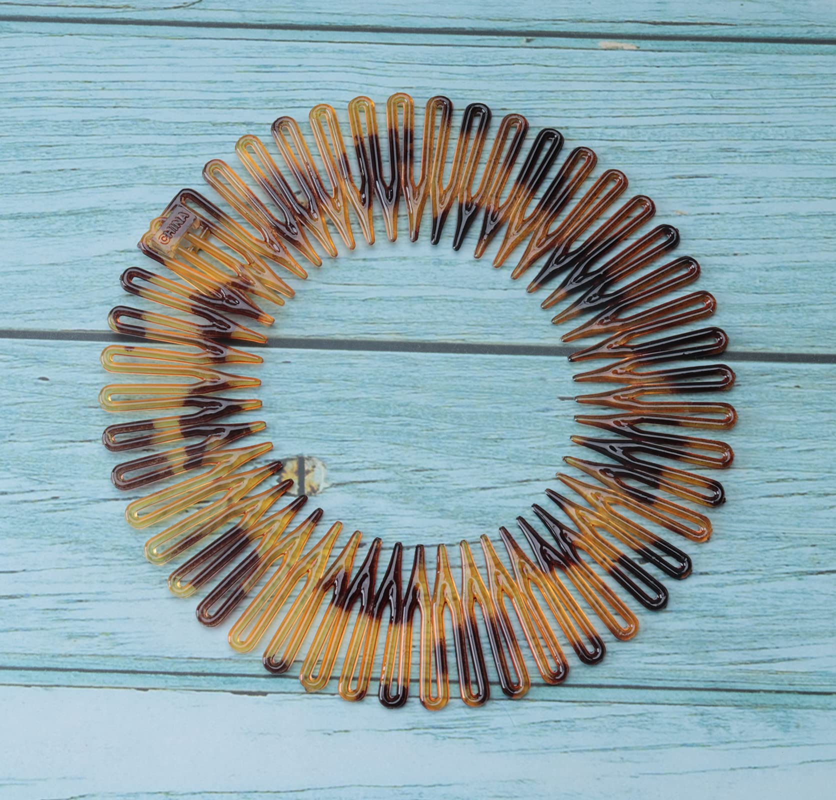 Sowaka lightweight-comfort round comb for easy wear all day.