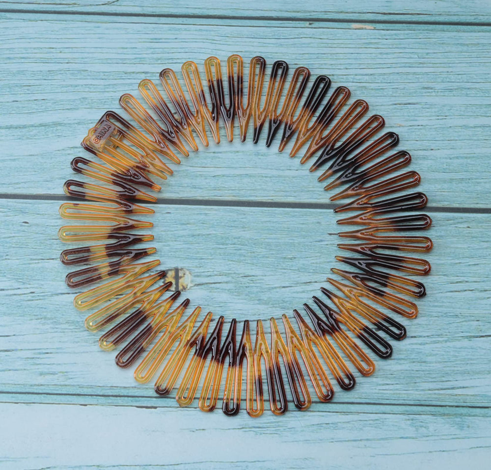 Sowaka lightweight-comfort round comb for easy wear all day.