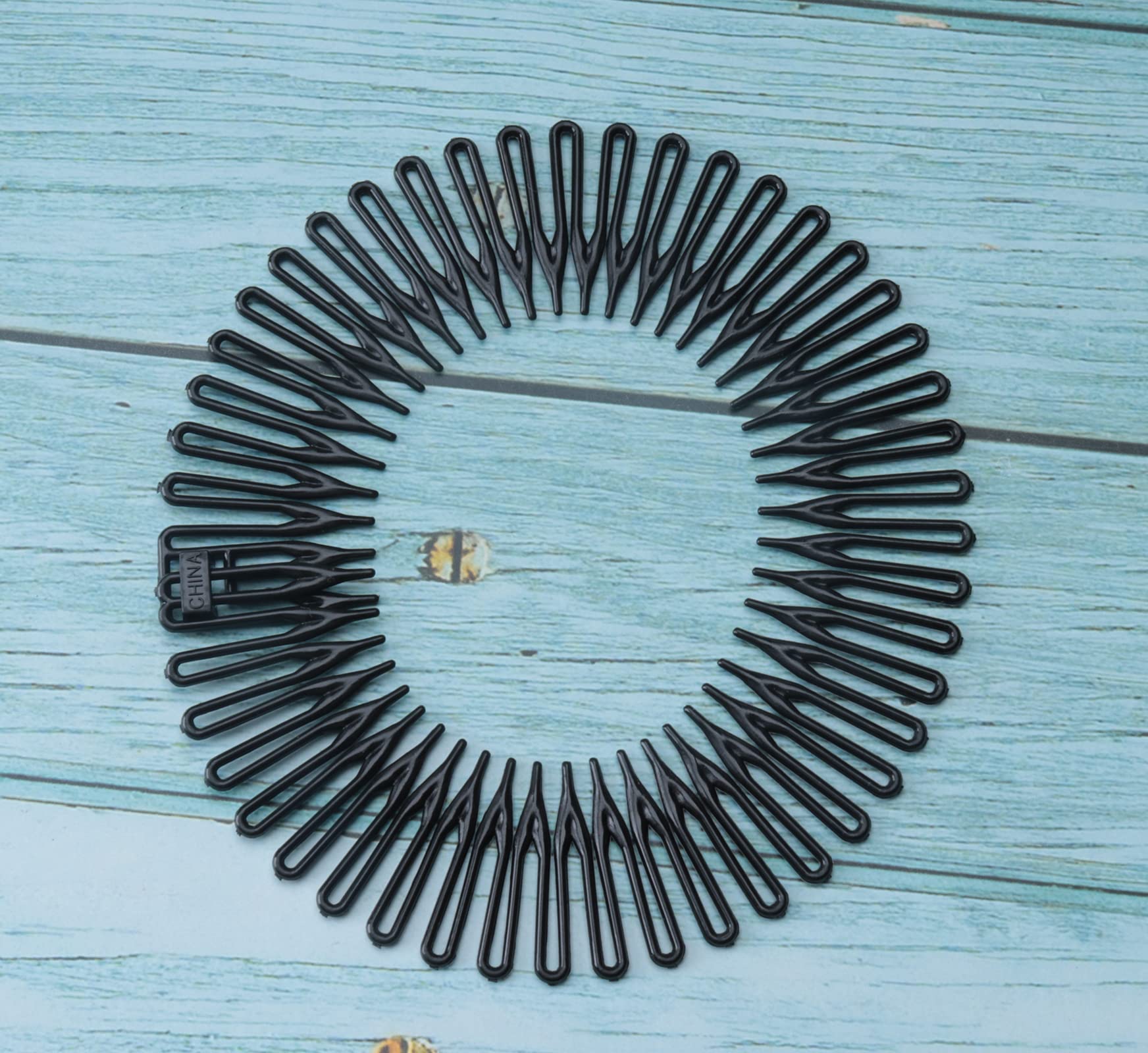 Sowaka round-stretch-comb hair-secure holds hair without snagging.