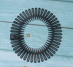 Sowaka round-stretch-comb hair-secure holds hair without snagging.