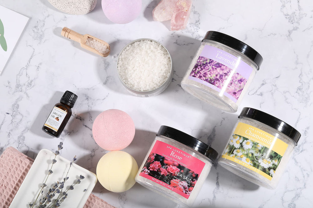 Spa Luxetique bath bombs fizzing to create a rich, moisturizing soak