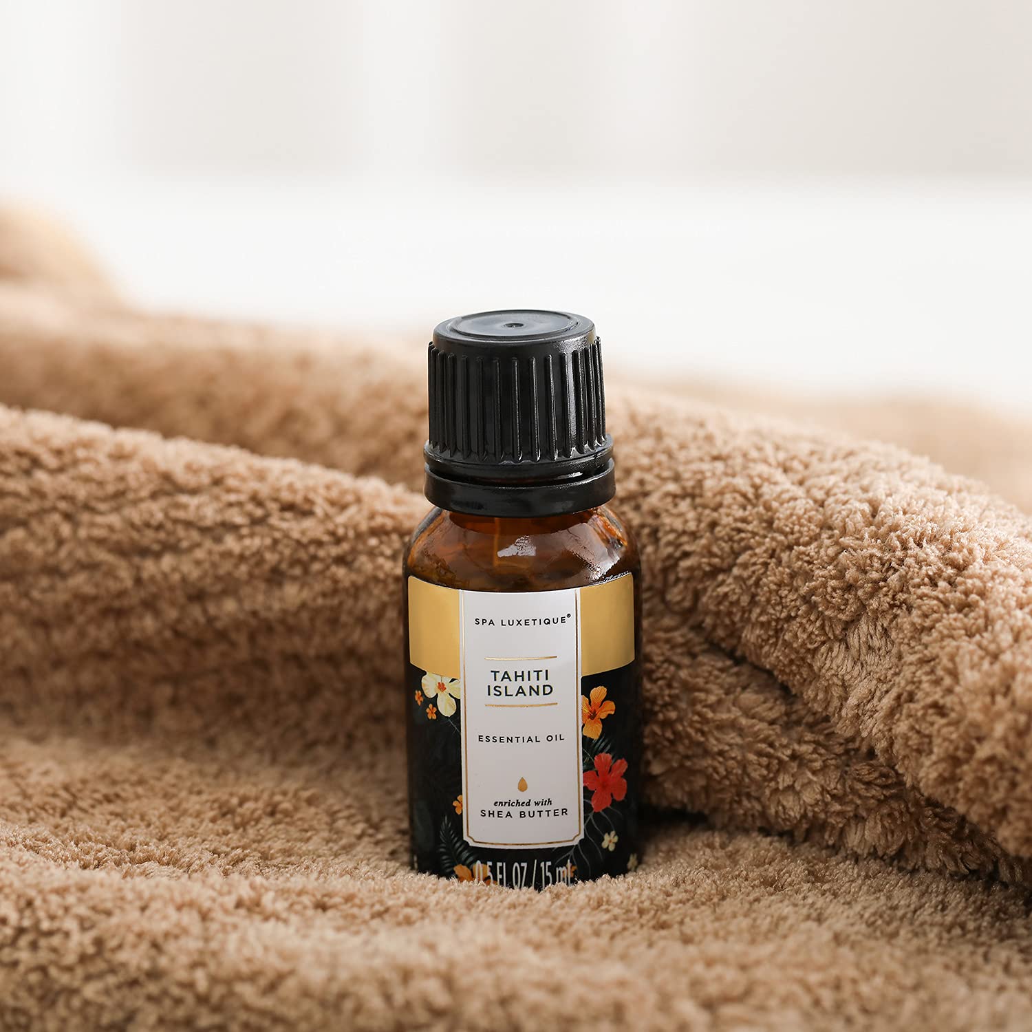 Spa Luxetique bath puff adding gentle lather for pampering cleanse.