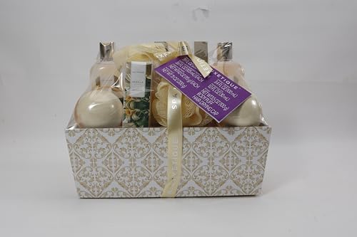 Spa Luxetique vanilla massage oil bottle offers calming self-care ritual.