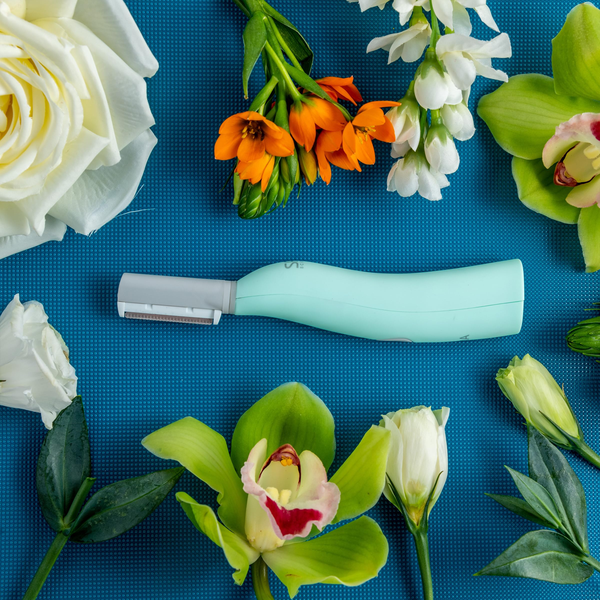 SPA SCIENCES SIMA dermaplaning tool warranty card highlights a two-year warranty.