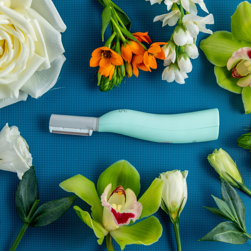 SPA SCIENCES SIMA dermaplaning tool warranty card highlights a two-year warranty.