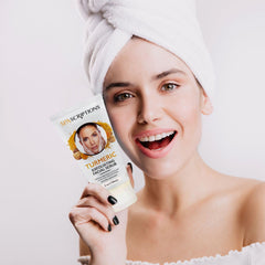 SpaScriptions Turmeric Exfoliating Scrub beads close-up for gentle pore cleansing