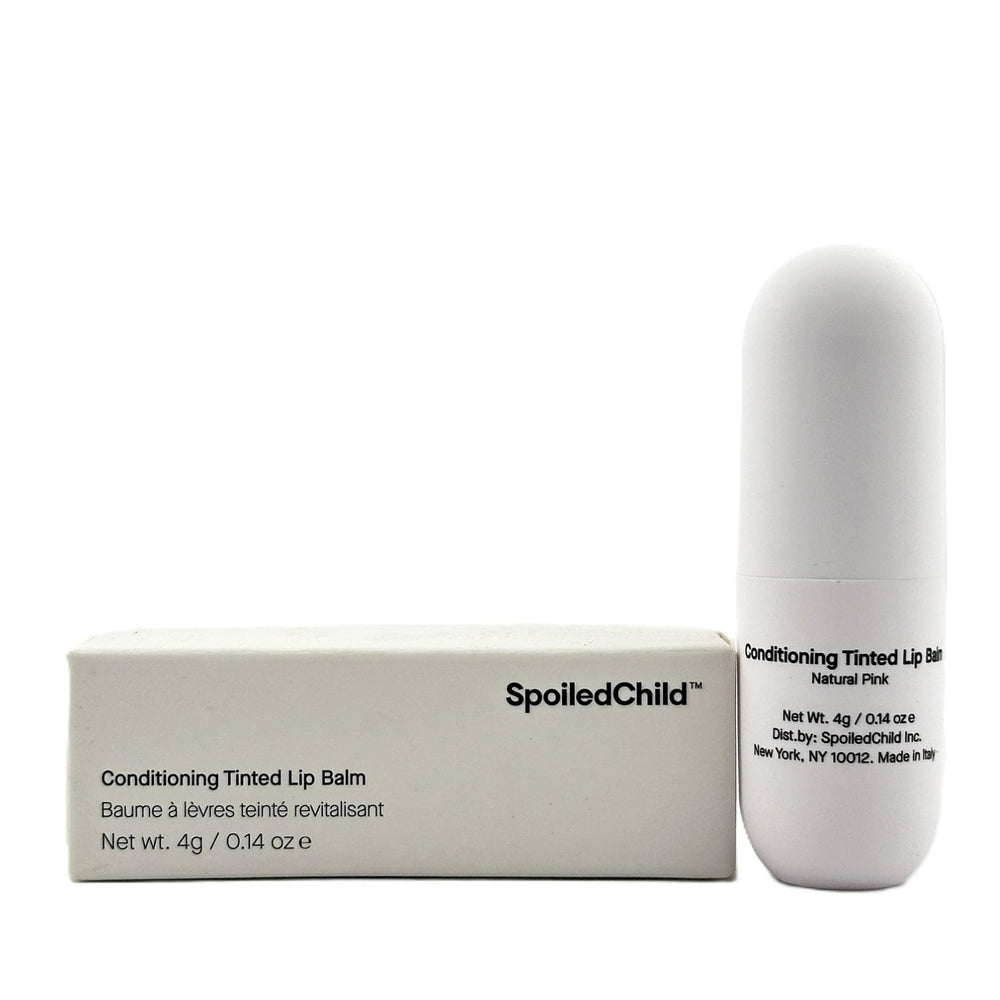 SpoiledChild lip balm plum application on lips demonstrates smooth glide and color payoff.