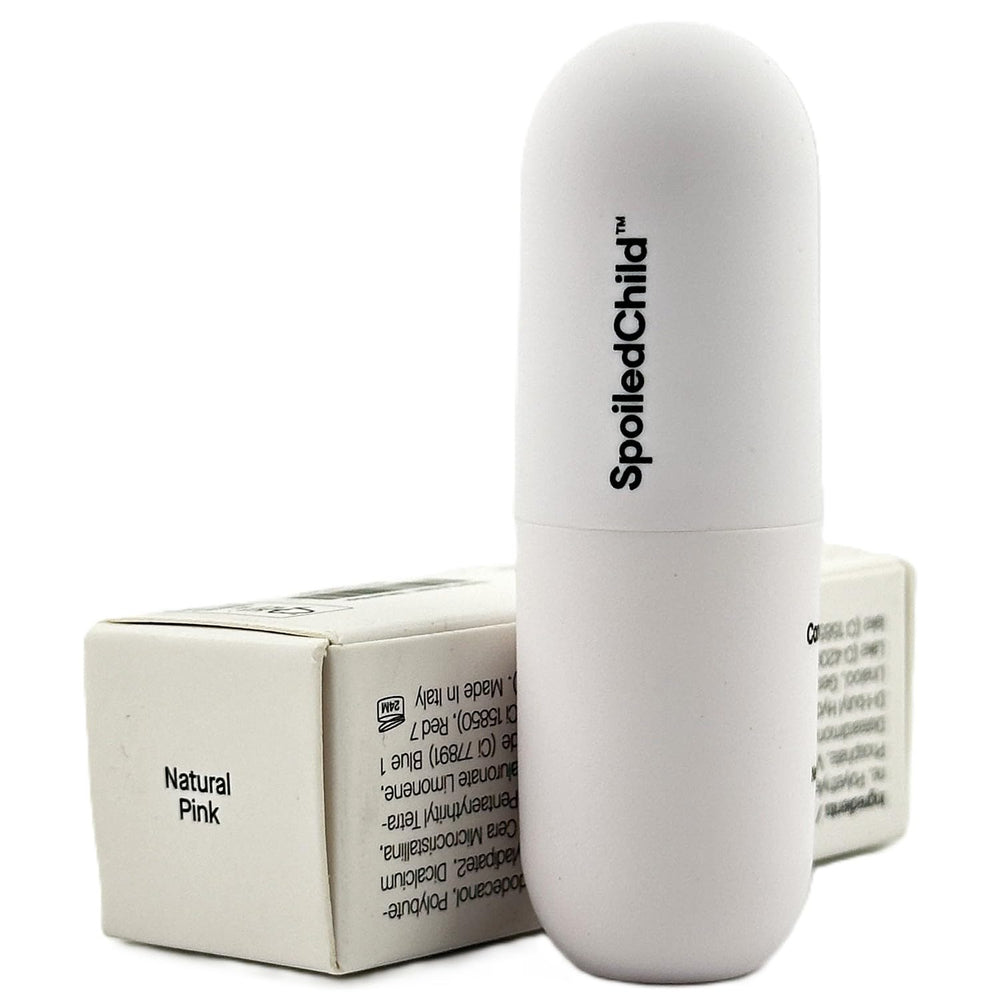 SpoiledChild lip balm plum packaging closeup emphasizes premium design and portable prep.