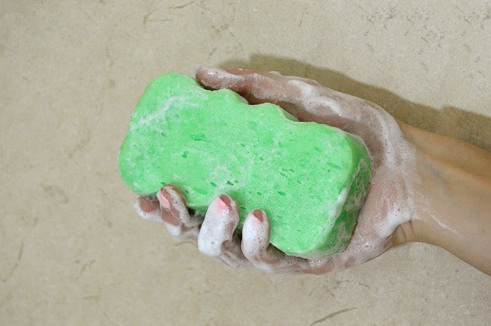 Spongeables smooth massage-side view highlights relaxing cleansing ritual